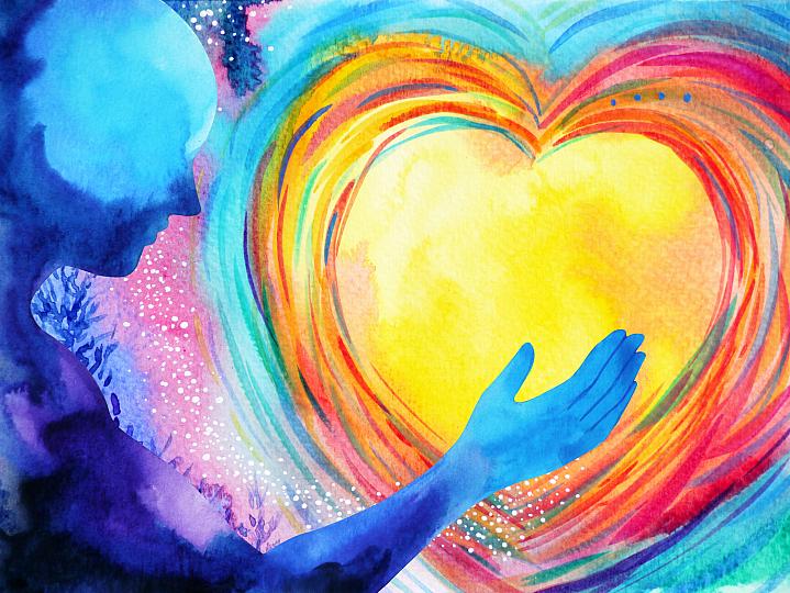 An abstract image of a person holding a heart An abstract image of a person holding a heart