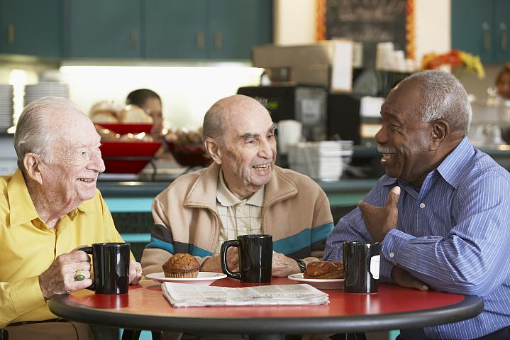 Older adult men drinking tea together Older adult men drinking tea together